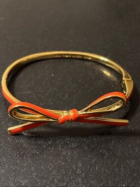 Kate Spade New York Skinny Mini Bow Bangle in Orange Enamel